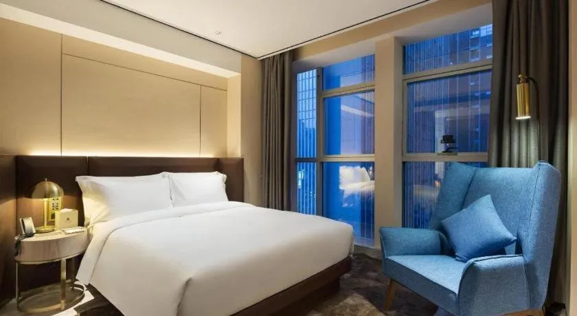 Bed in Echarm Plus Hotel Changsha High-speed Railway South Station Desiqin