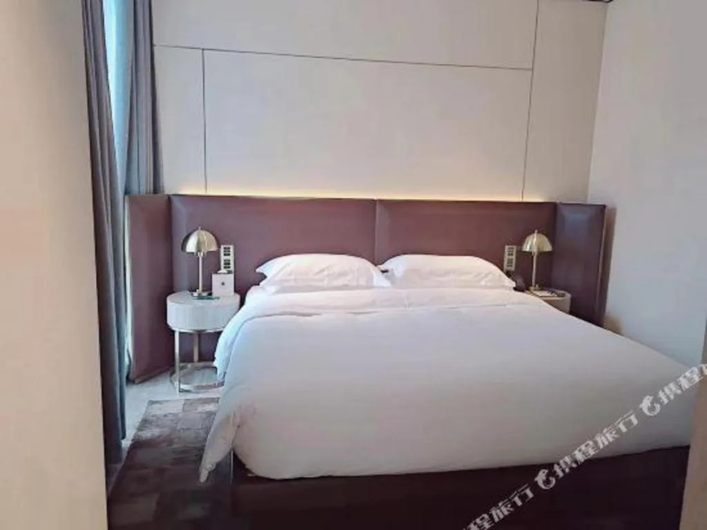 Bed in Echarm Plus Hotel Changsha High-speed Railway South Station Desiqin