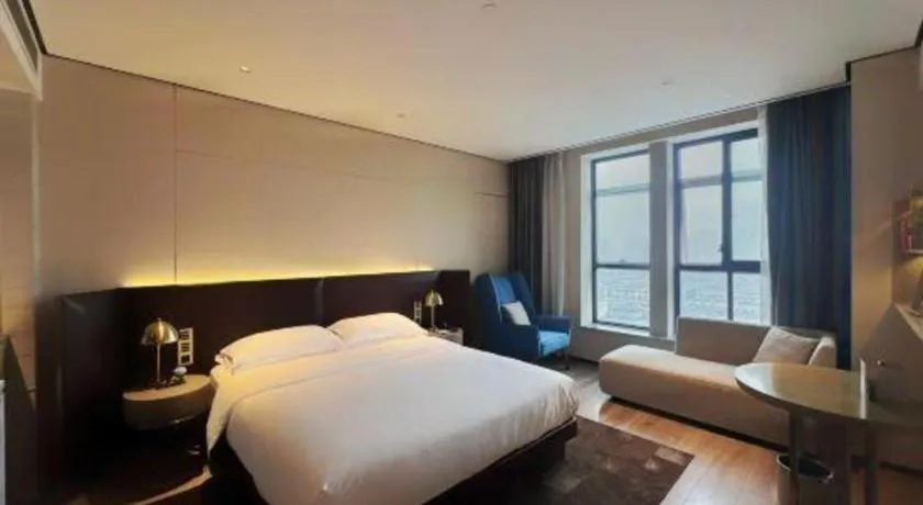 Bed in Echarm Plus Hotel Changsha High-speed Railway South Station Desiqin