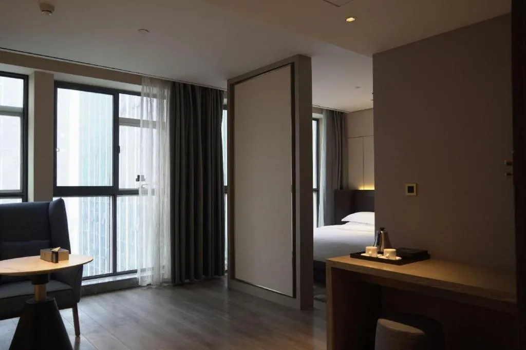Bed in Echarm Plus Hotel Changsha High-speed Railway South Station Desiqin