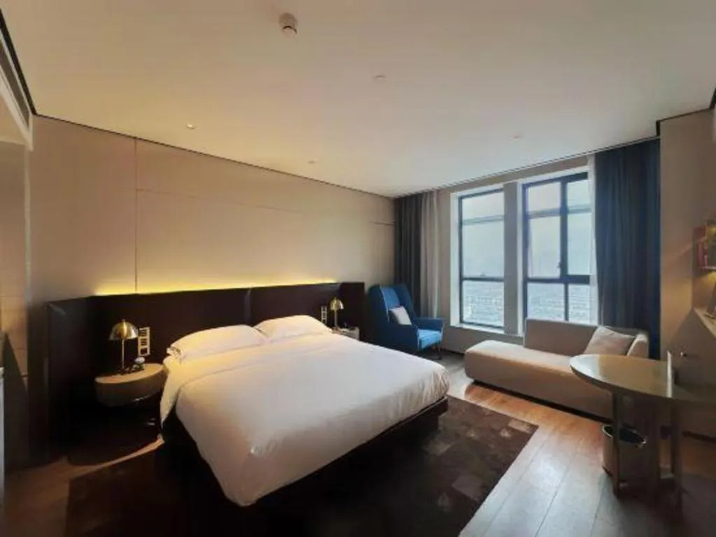 Bed in Echarm Plus Hotel Changsha High-speed Railway South Station Desiqin