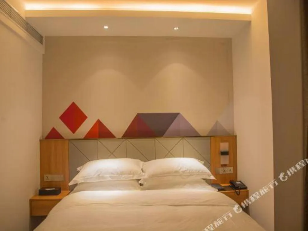 Bed in Borrman Hotel Jingzhou Jiangjin West Road Wanda Plaza Fantawild
