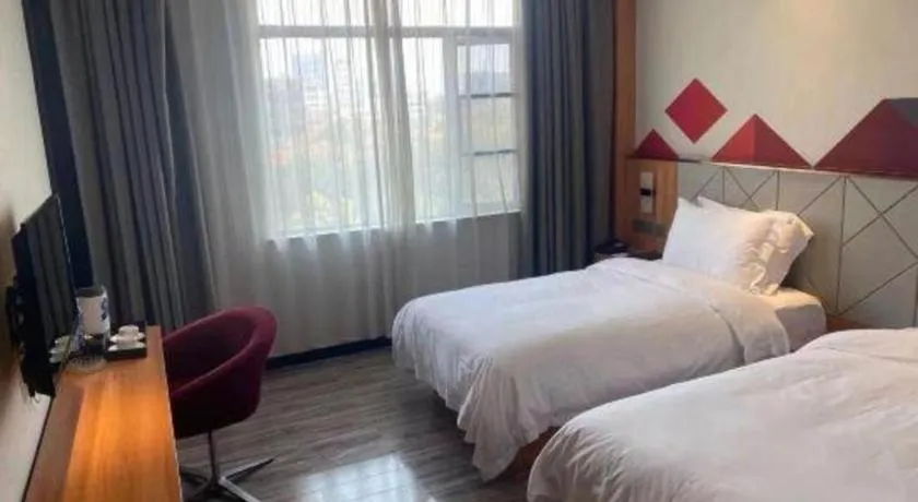 Bed in Borrman Hotel Jingzhou Jiangjin West Road Wanda Plaza Fantawild