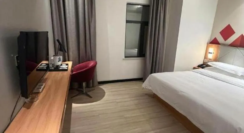 Bed in Borrman Hotel Jingzhou Jiangjin West Road Wanda Plaza Fantawild