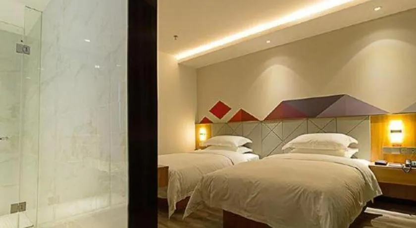 Bed in Borrman Hotel Jingzhou Jiangjin West Road Wanda Plaza Fantawild