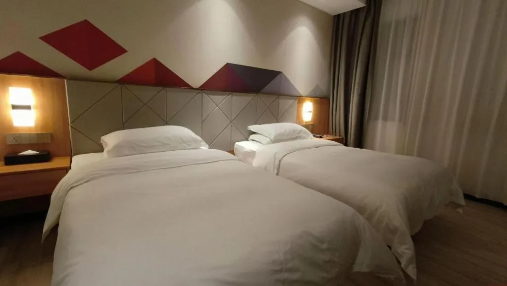 Bed in Borrman Hotel Jingzhou Jiangjin West Road Wanda Plaza Fantawild