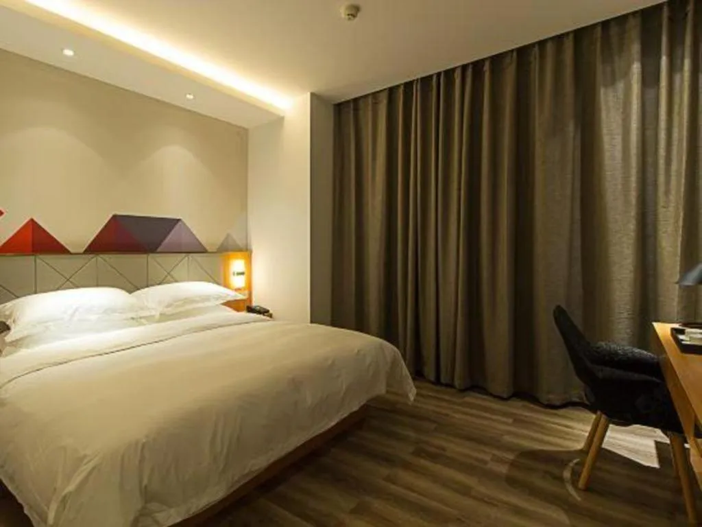 Bed in Borrman Hotel Jingzhou Jiangjin West Road Wanda Plaza Fantawild