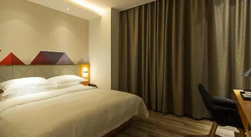 Bed in Borrman Hotel Jingzhou Jiangjin West Road Wanda Plaza Fantawild Bed in Borrman Hotel Jingzhou Jiangjin West Road Wanda Plaza Fantawild