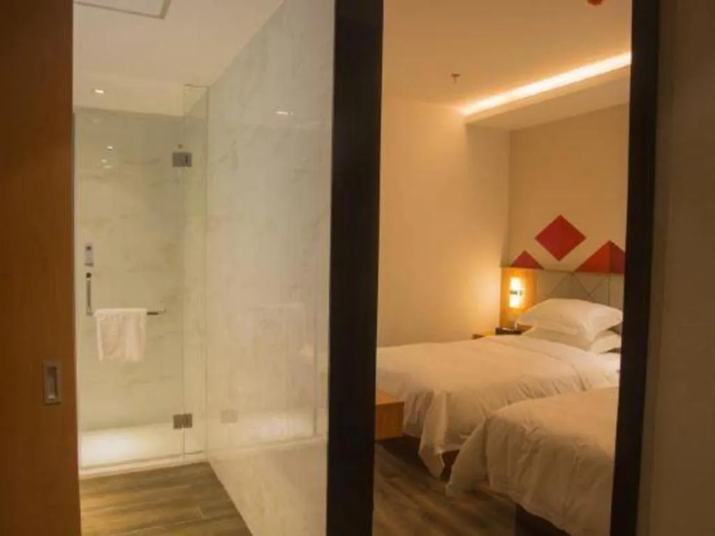 Bed in Borrman Hotel Jingzhou Jiangjin West Road Wanda Plaza Fantawild