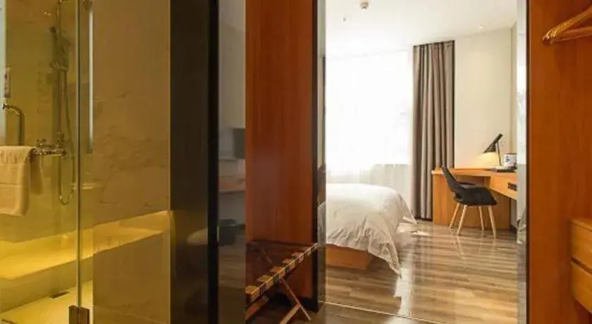 Bed in Borrman Hotel Jingzhou Jiangjin West Road Wanda Plaza Fantawild Bed in Borrman Hotel Jingzhou Jiangjin West Road Wanda Plaza Fantawild