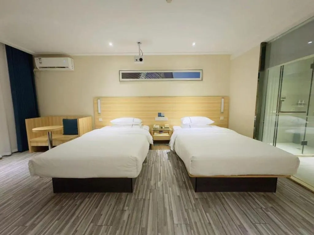 Bed in City Comfort Inn Wuhan Hongshan District Baishazhou Huangjiahu University Town