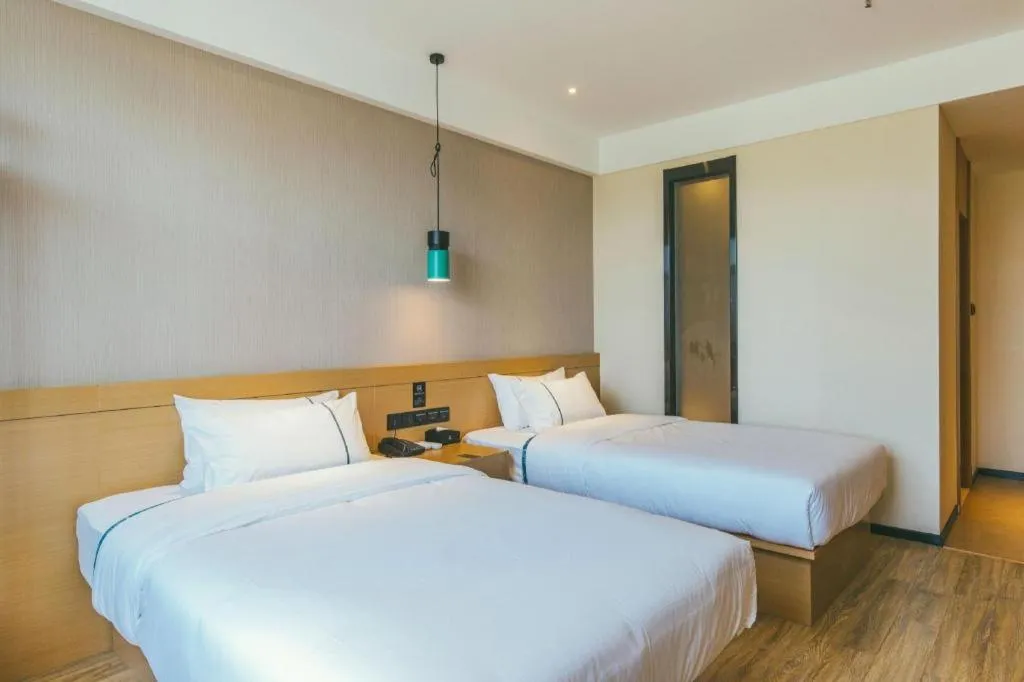 Bed in City Comfort Inn Wuhan Hongshan District Baishazhou Huangjiahu University Town