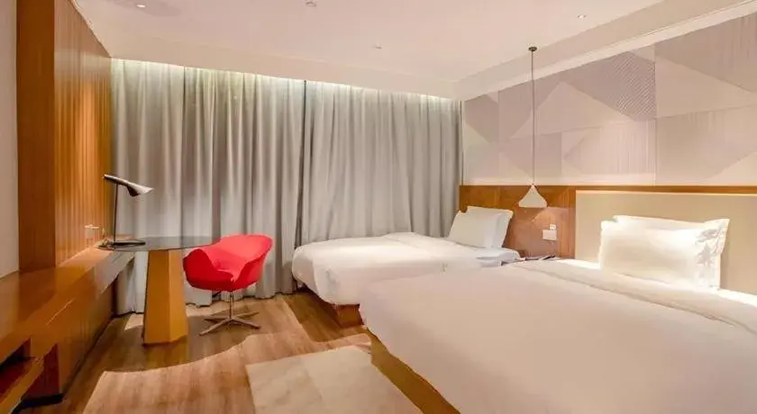 Bed in Borrman Hotel Nanning Beihu Bei Road Metro Station Bed in Borrman Hotel Nanning Beihu Bei Road Metro Station