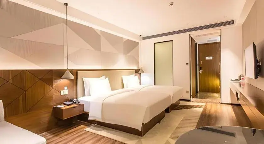 Bed in Borrman Hotel Nanning Beihu Bei Road Metro Station Bed in Borrman Hotel Nanning Beihu Bei Road Metro Station