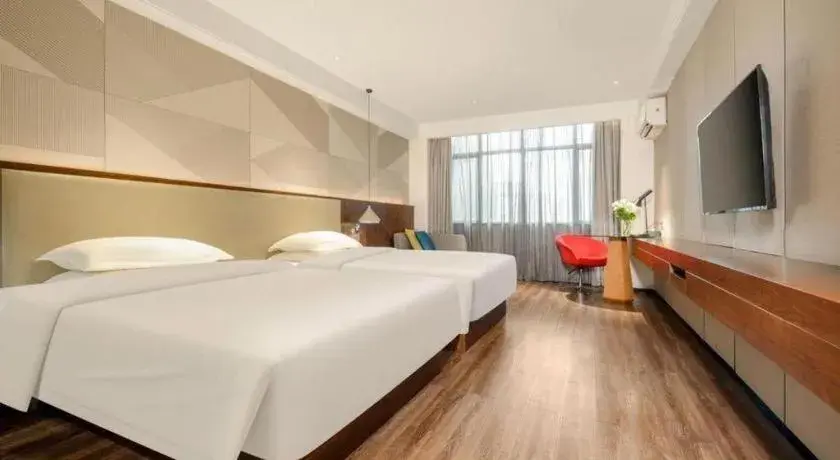 Bed in Borrman Hotel Nanning Beihu Bei Road Metro Station Bed in Borrman Hotel Nanning Beihu Bei Road Metro Station