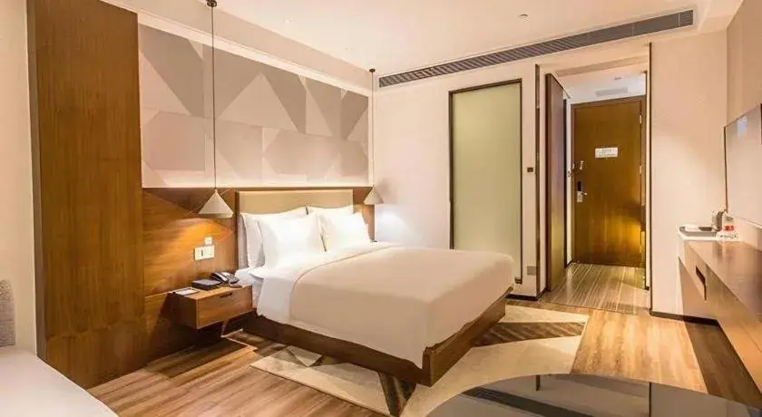 Bed in Borrman Hotel Nanning Beihu Bei Road Metro Station Bed in Borrman Hotel Nanning Beihu Bei Road Metro Station