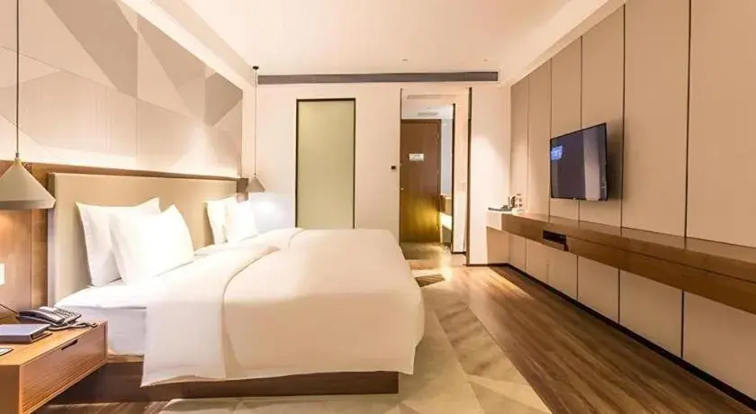 Bed in Borrman Hotel Nanning Beihu Bei Road Metro Station Bed in Borrman Hotel Nanning Beihu Bei Road Metro Station