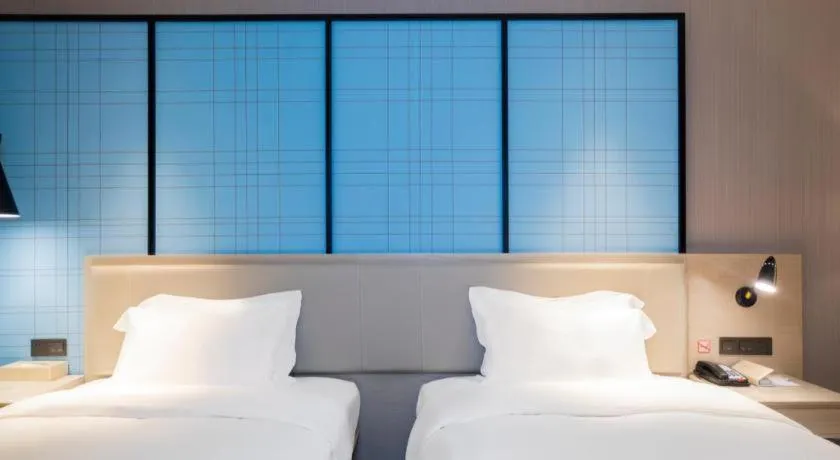 Bed in Echarm Hotel Guilin Zhongshan Zhong Road Liangjiang Sihu