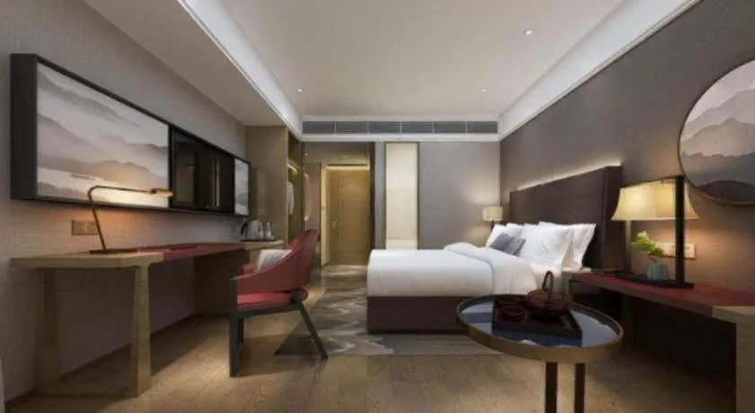 Bed in Echeng Hotel Changsha Evening News