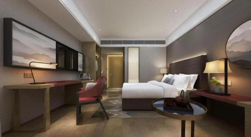 Bed in Echeng Hotel Changsha Evening News