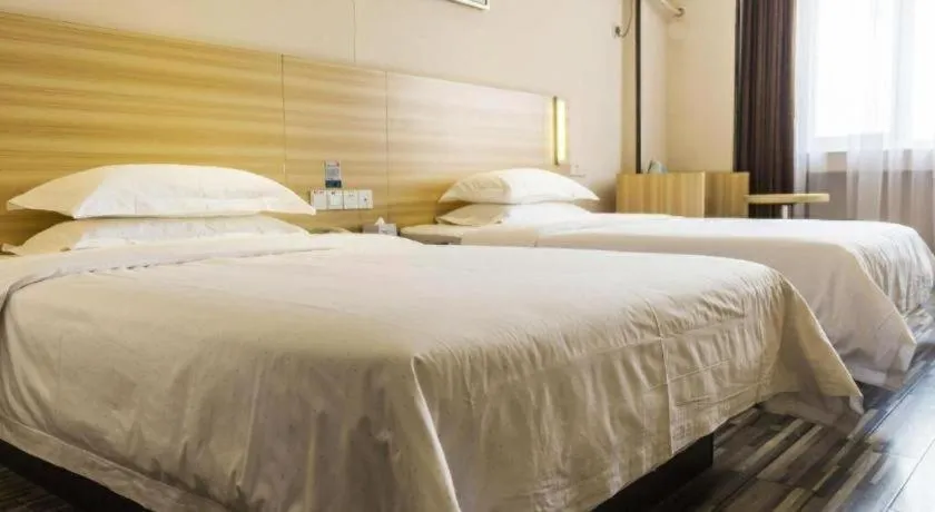 Bed in Jtour Inn Wuhan Hankou Railway East Plaza