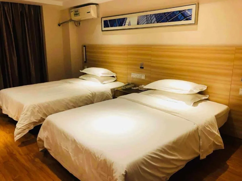 Bed in Jtour Inn Wuhan Hankou Railway East Plaza