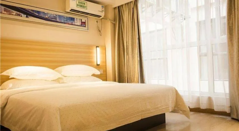 Bed in Jtour Inn Wuhan Hankou Railway East Plaza