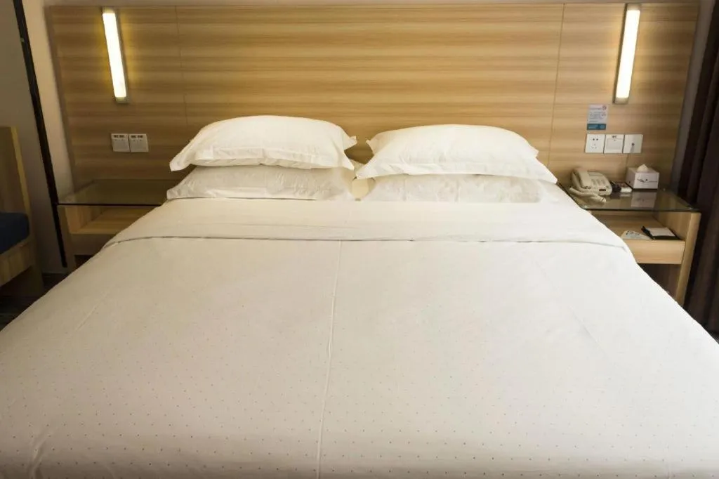 Bed in Jtour Inn Wuhan Hankou Railway East Plaza
