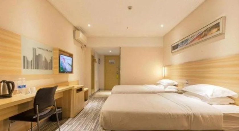 Bed in Jtour Inn Wuhan Hankou Railway East Plaza