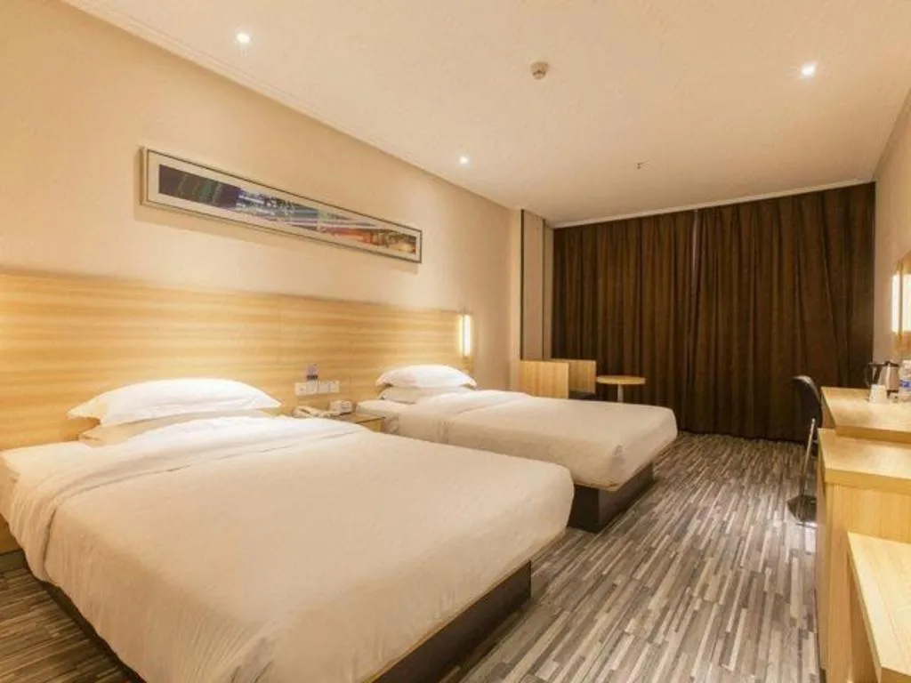 Bed in Jtour Inn Wuhan Hankou Railway East Plaza