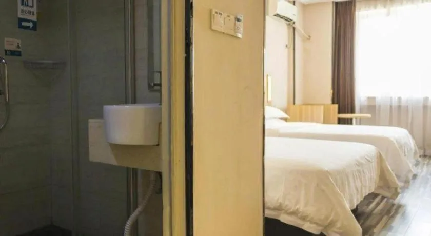 Bed in Jtour Inn Wuhan Hankou Railway East Plaza