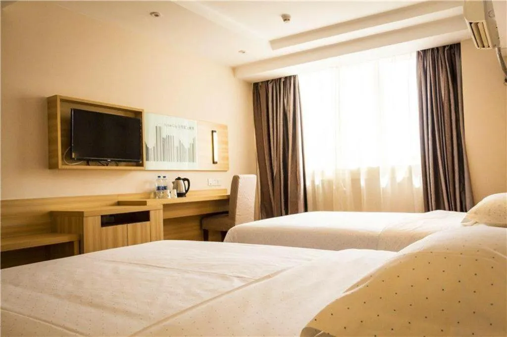 Bed in Jtour Inn Wuhan Hankou Railway East Plaza