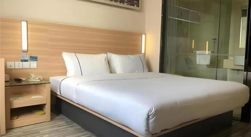 Bed in City Comfort Inn Wuhan Dongwu Avenue Light Rail Station