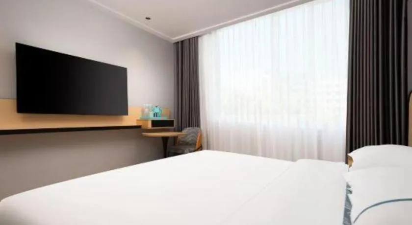 Bed in City Comfort Inn Wuhan Dongwu Avenue Light Rail Station