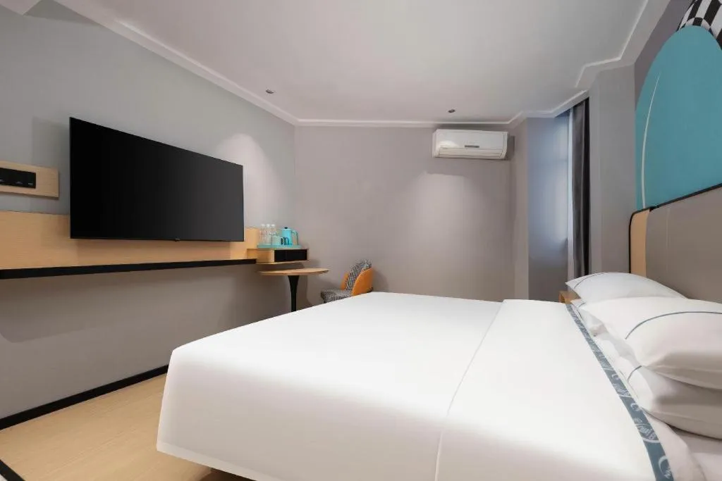 Bed in City Comfort Inn Wuhan Dongwu Avenue Light Rail Station