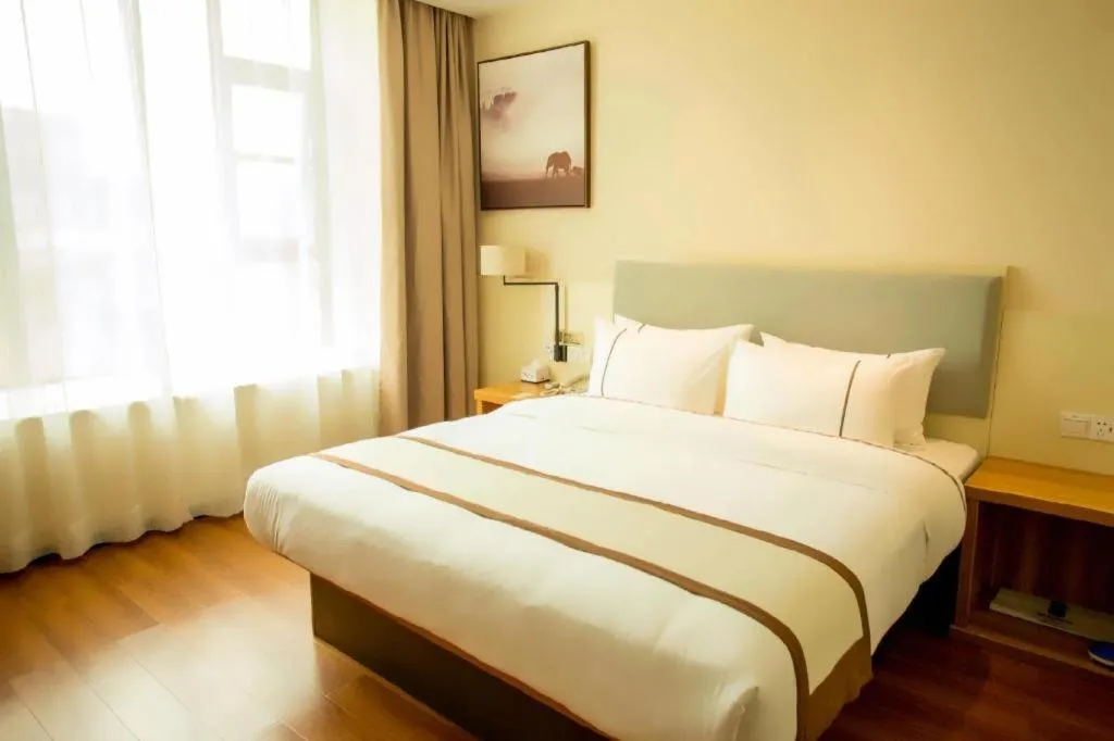 Bed in JTOUR Inn Hechi Yizhou Municipal Central Plaza