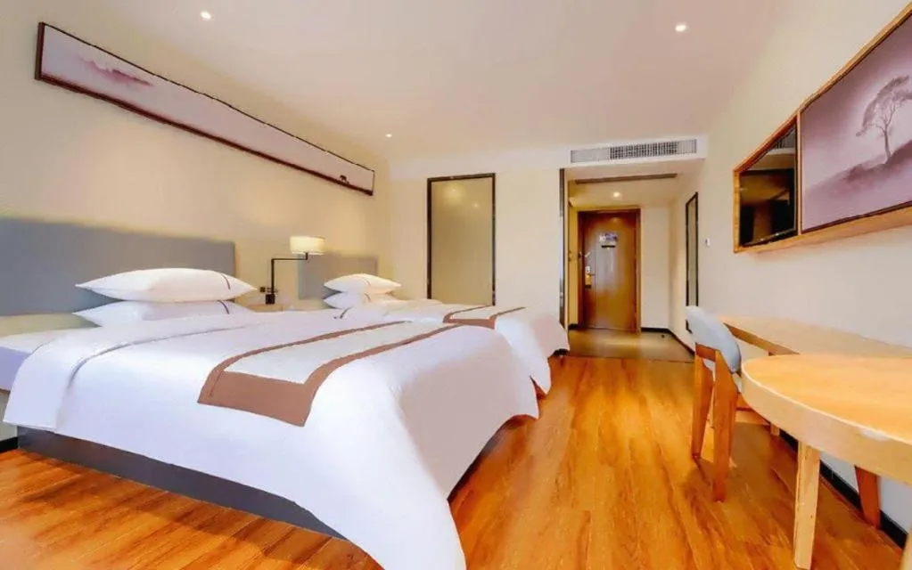 Bed in JTOUR Inn Hechi Yizhou Municipal Central Plaza