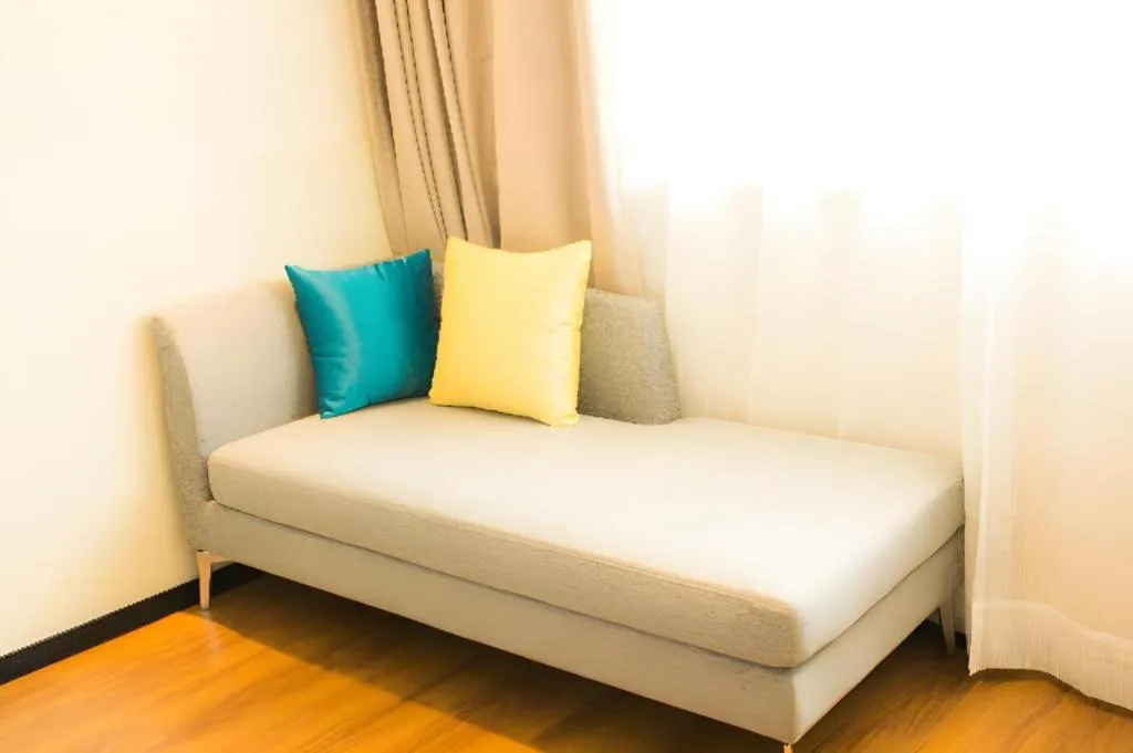 Bed in JTOUR Inn Hechi Yizhou Municipal Central Plaza