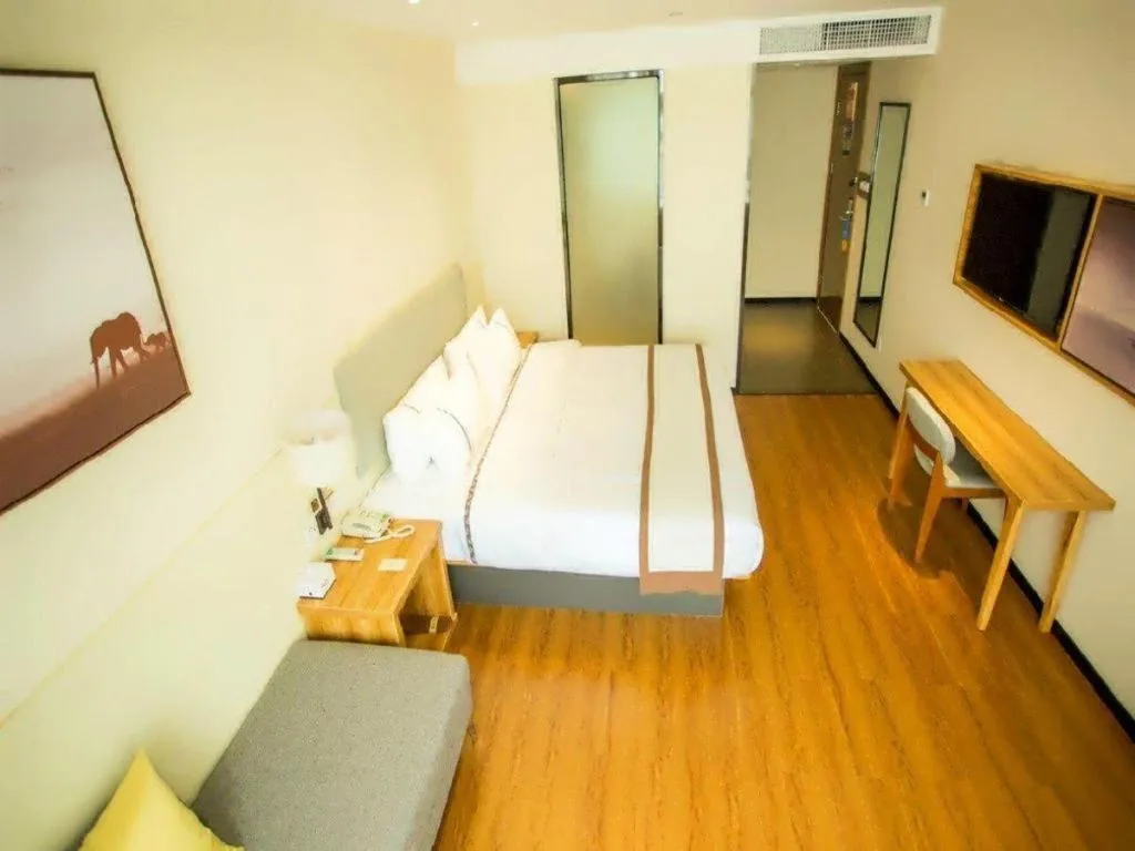 Bed in JTOUR Inn Hechi Yizhou Municipal Central Plaza