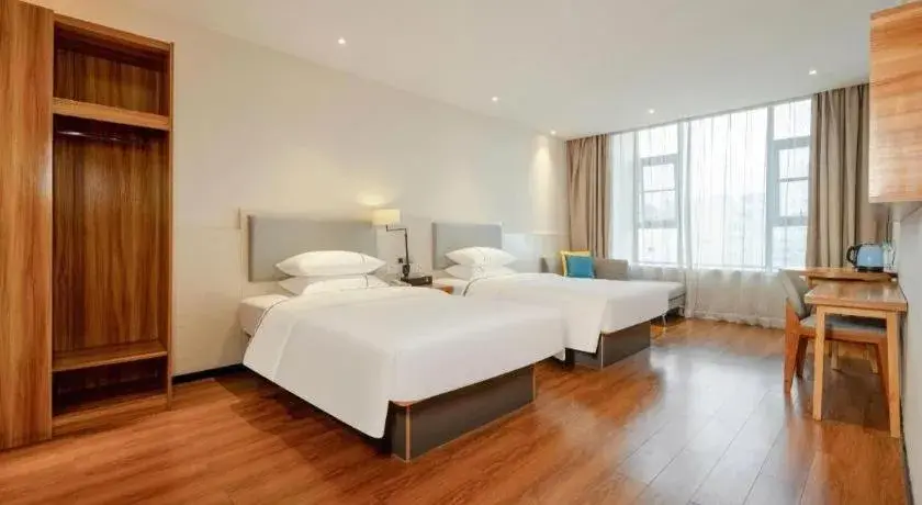 Bed in JTOUR Inn Hechi Yizhou Municipal Central Plaza Bed in JTOUR Inn Hechi Yizhou Municipal Central Plaza