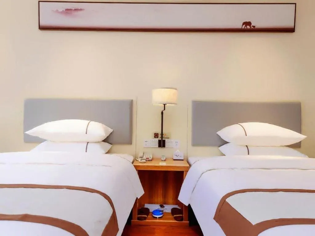 Bed in JTOUR Inn Hechi Yizhou Municipal Central Plaza