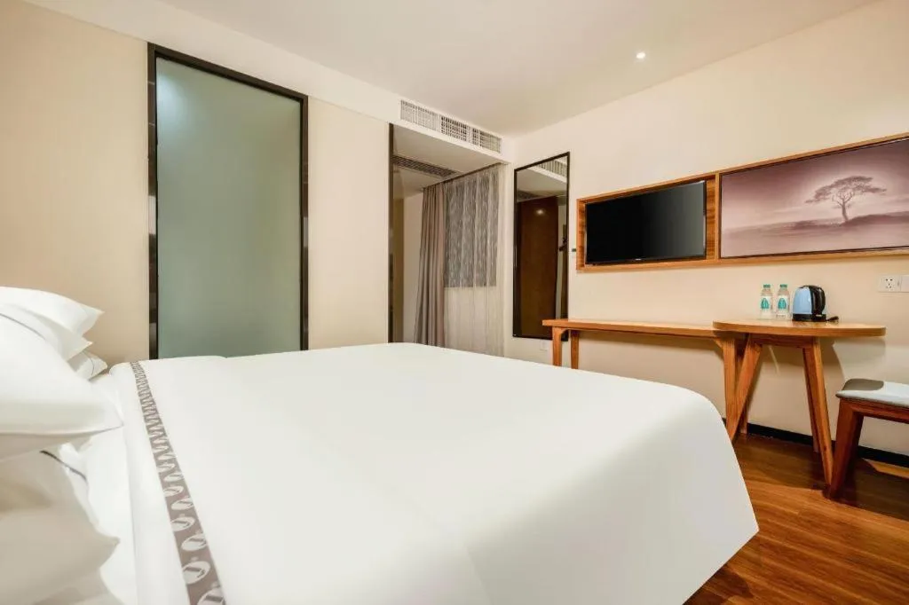 Bed in JTOUR Inn Hechi Yizhou Municipal Central Plaza