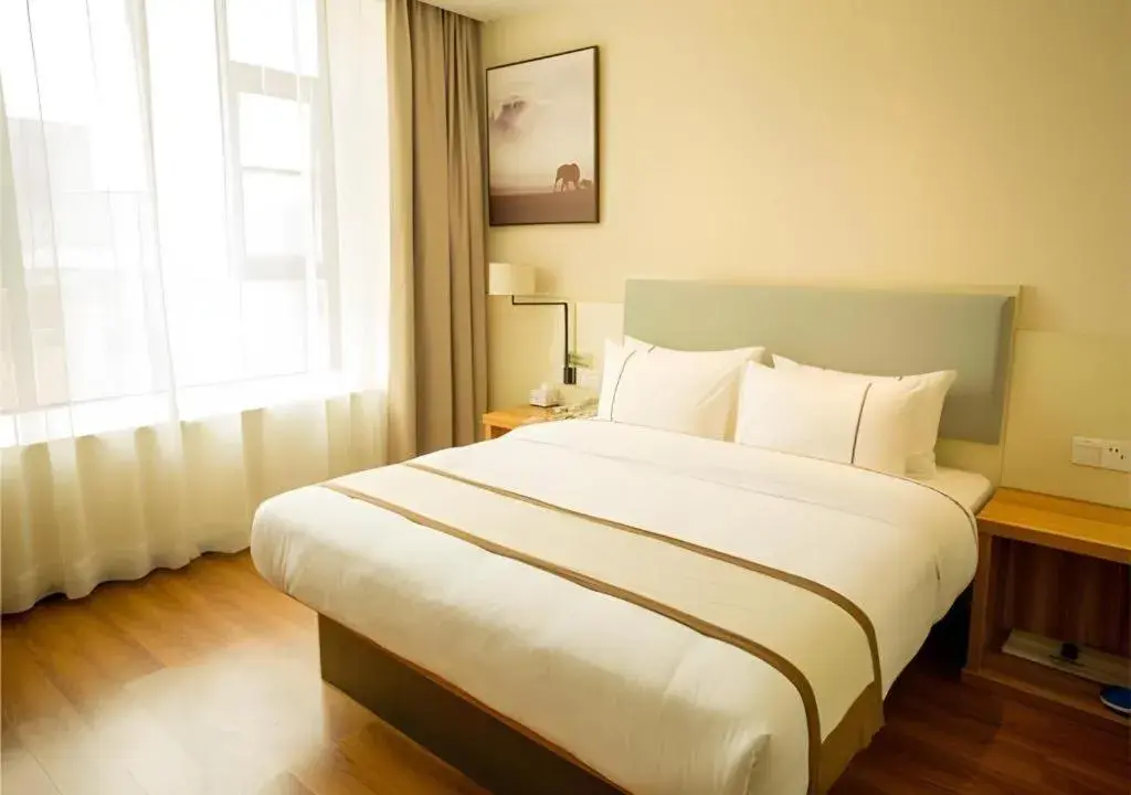 Bed in JTOUR Inn Hechi Yizhou Municipal Central Plaza Bed in JTOUR Inn Hechi Yizhou Municipal Central Plaza