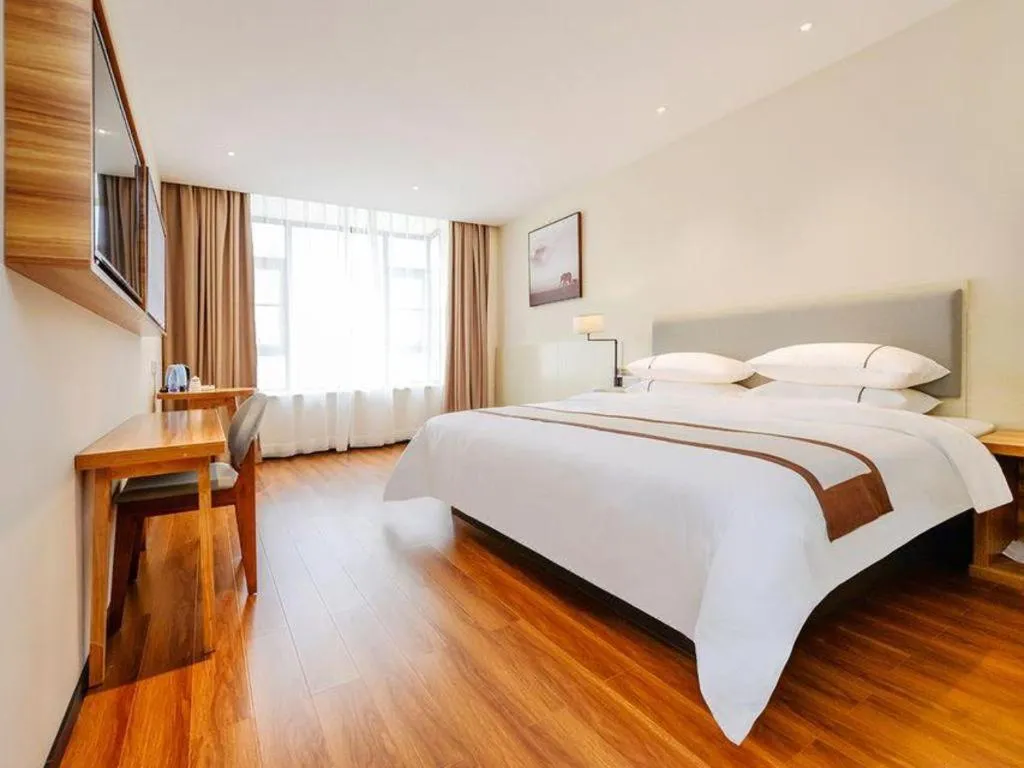 Bed in JTOUR Inn Hechi Yizhou Municipal Central Plaza