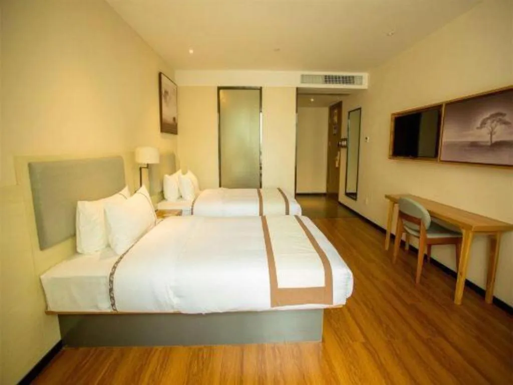 Bed in JTOUR Inn Hechi Yizhou Municipal Central Plaza