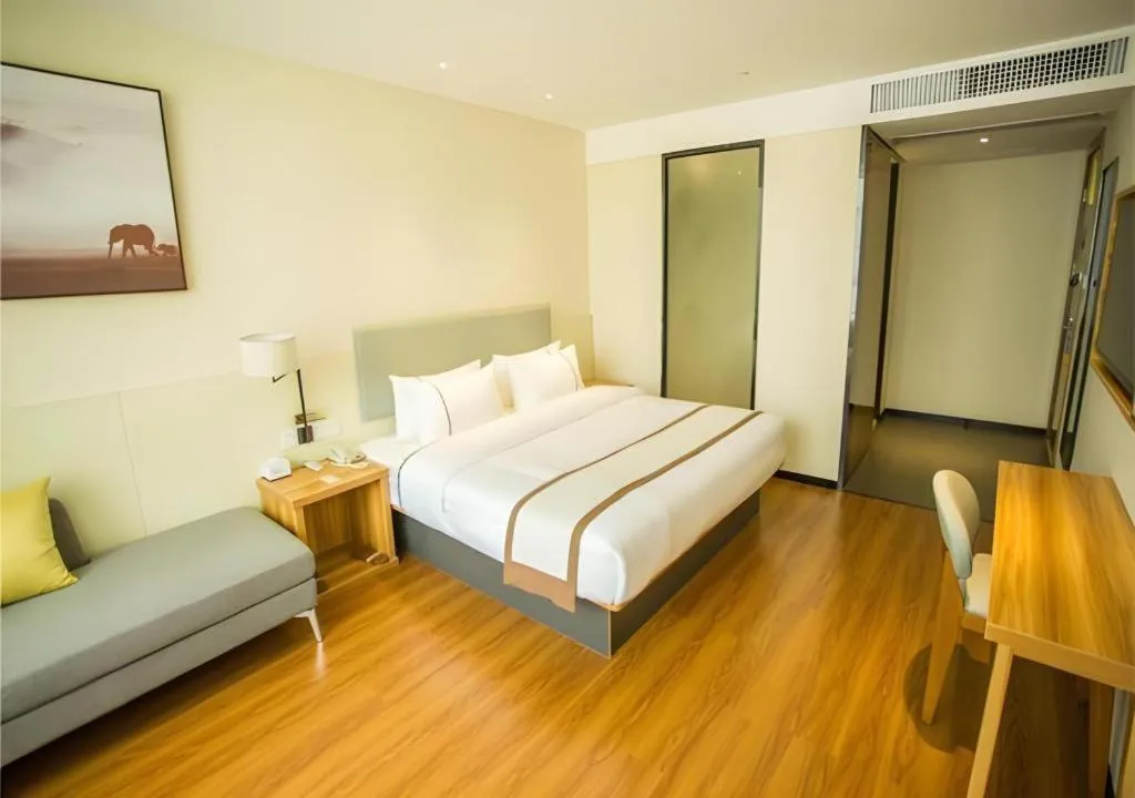 Bed in JTOUR Inn Hechi Yizhou Municipal Central Plaza