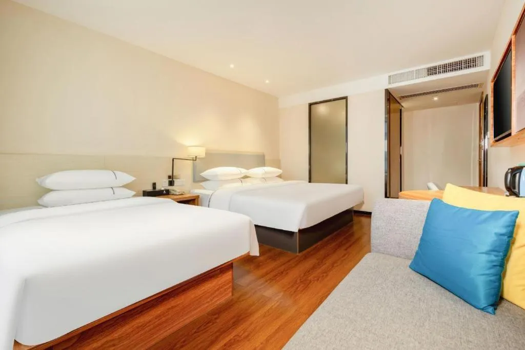 Bed in JTOUR Inn Hechi Yizhou Municipal Central Plaza