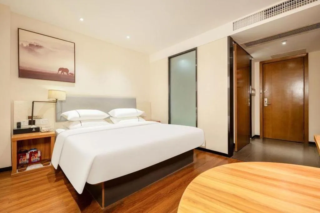 Bed in JTOUR Inn Hechi Yizhou Municipal Central Plaza