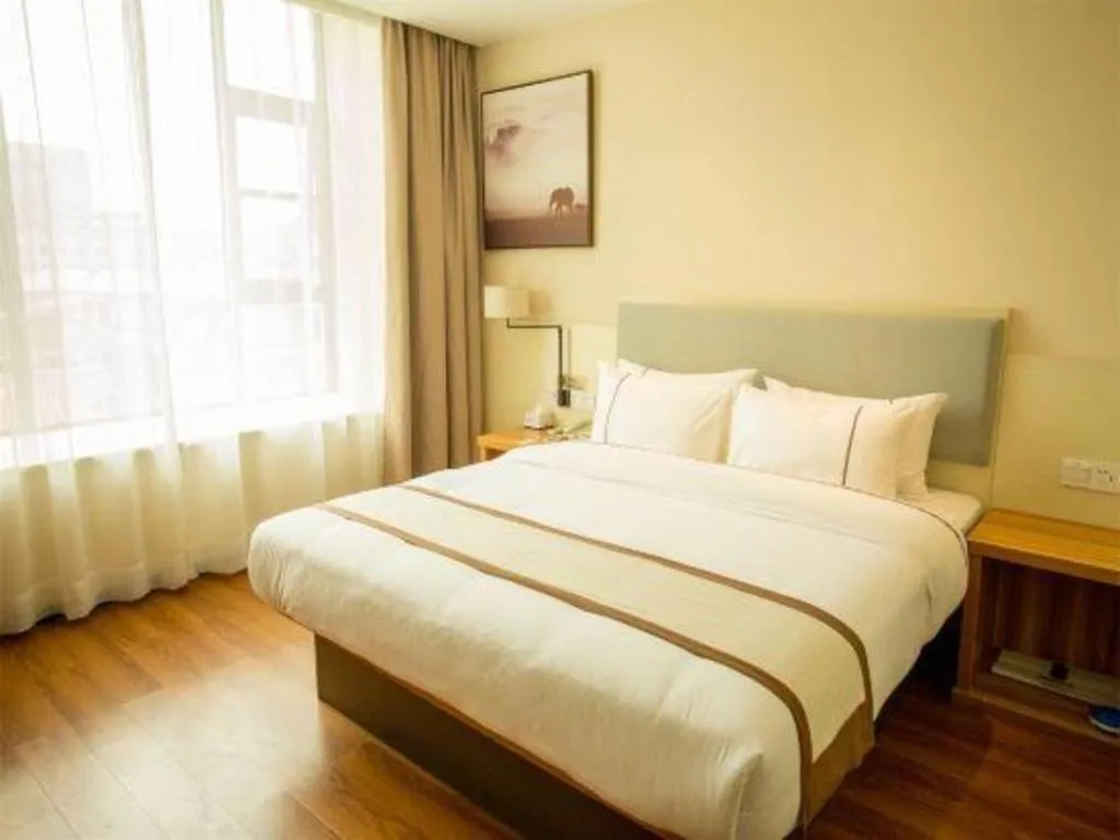 Bed in JTOUR Inn Hechi Yizhou Municipal Central Plaza