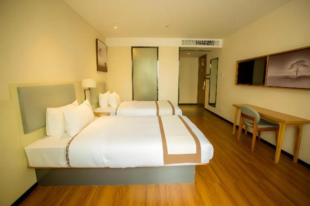 Bed in JTOUR Inn Hechi Yizhou Municipal Central Plaza